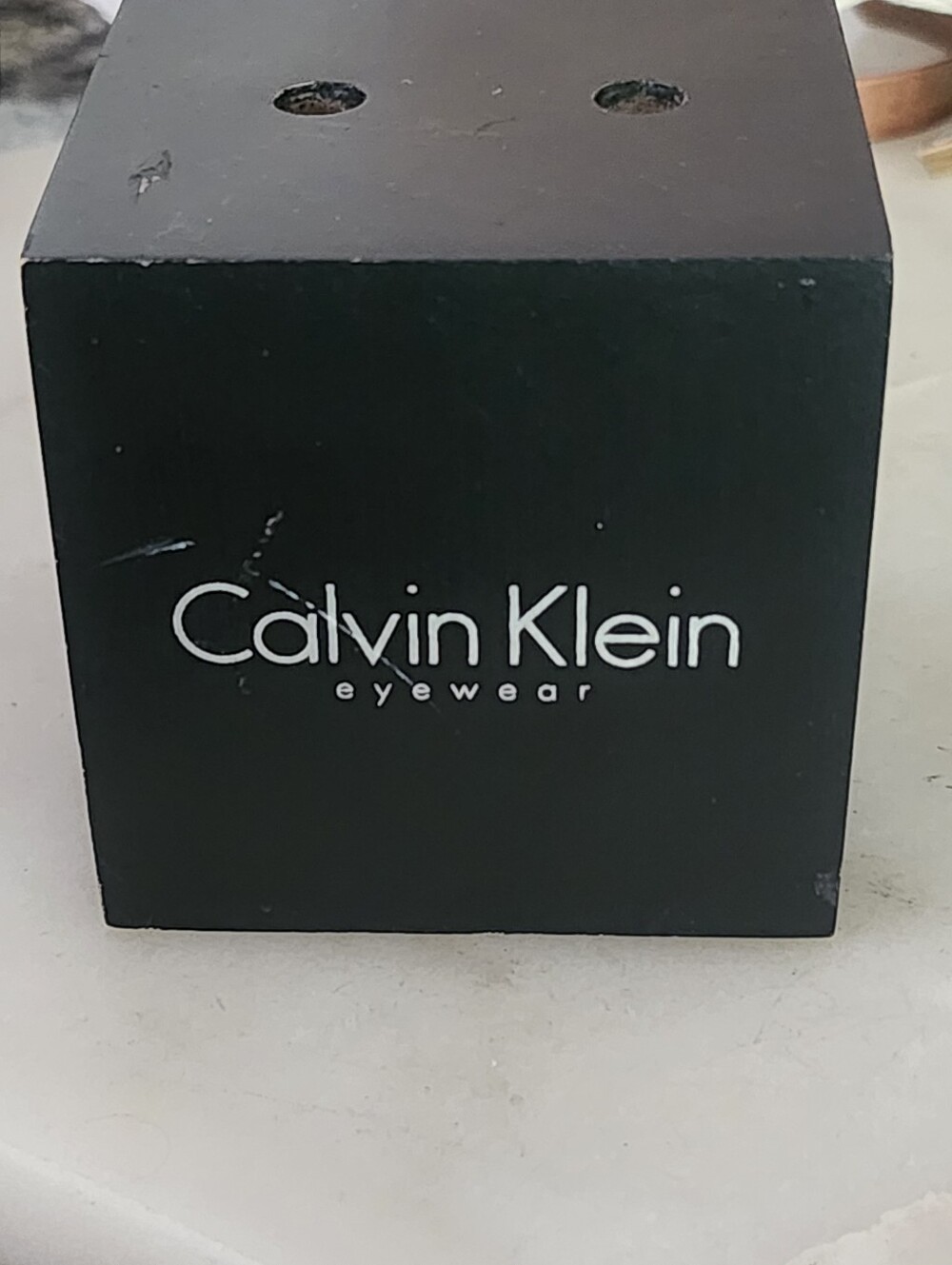 Calvin Klein Black Eyewear Wooden Display with White Logo